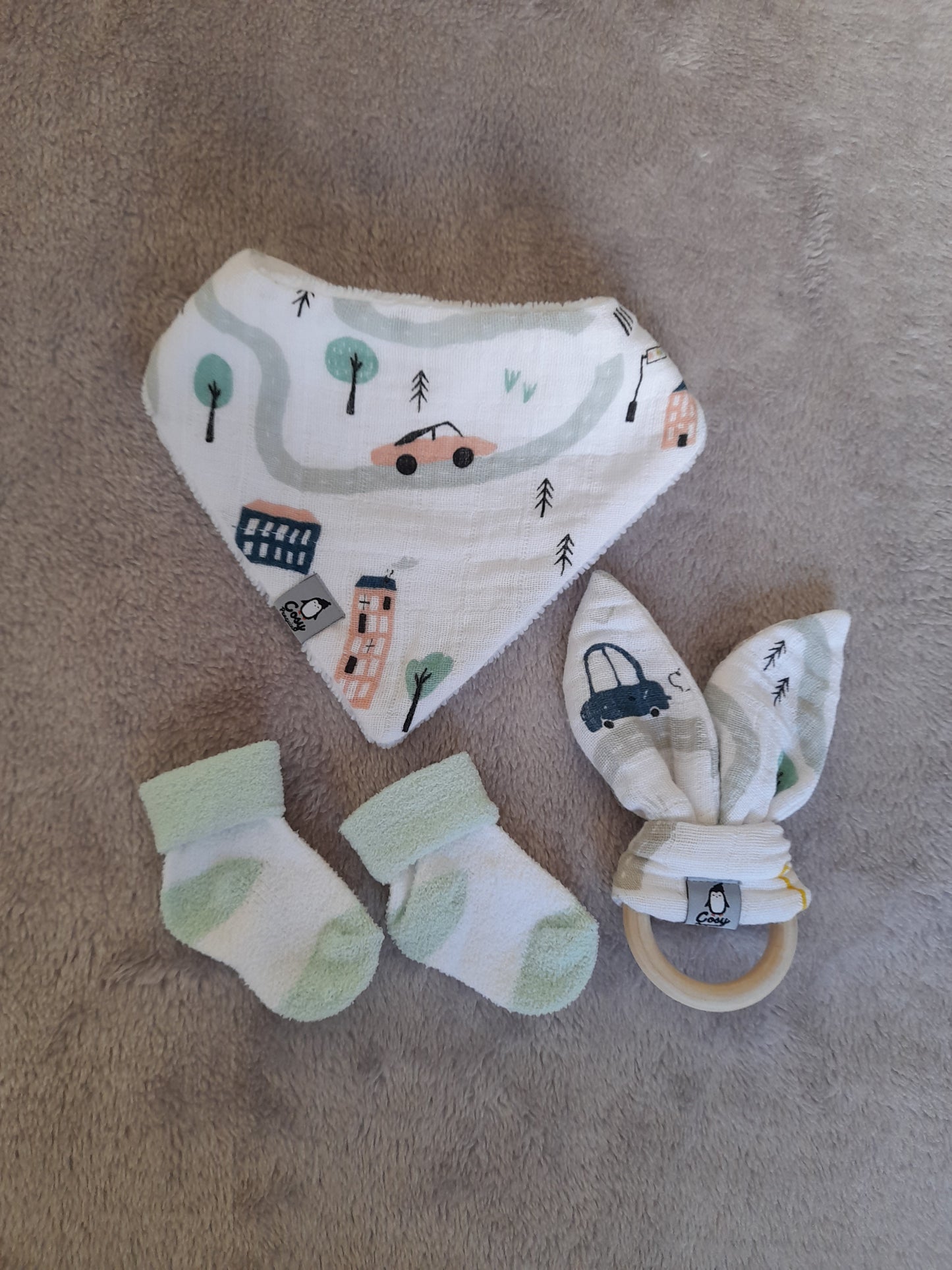 Muslin gift set G1 – set of 5 - City Cars Auto print. Two bibs, Wooden ring, Socks, Baby burp cloth and Muslin cuddle blanket.